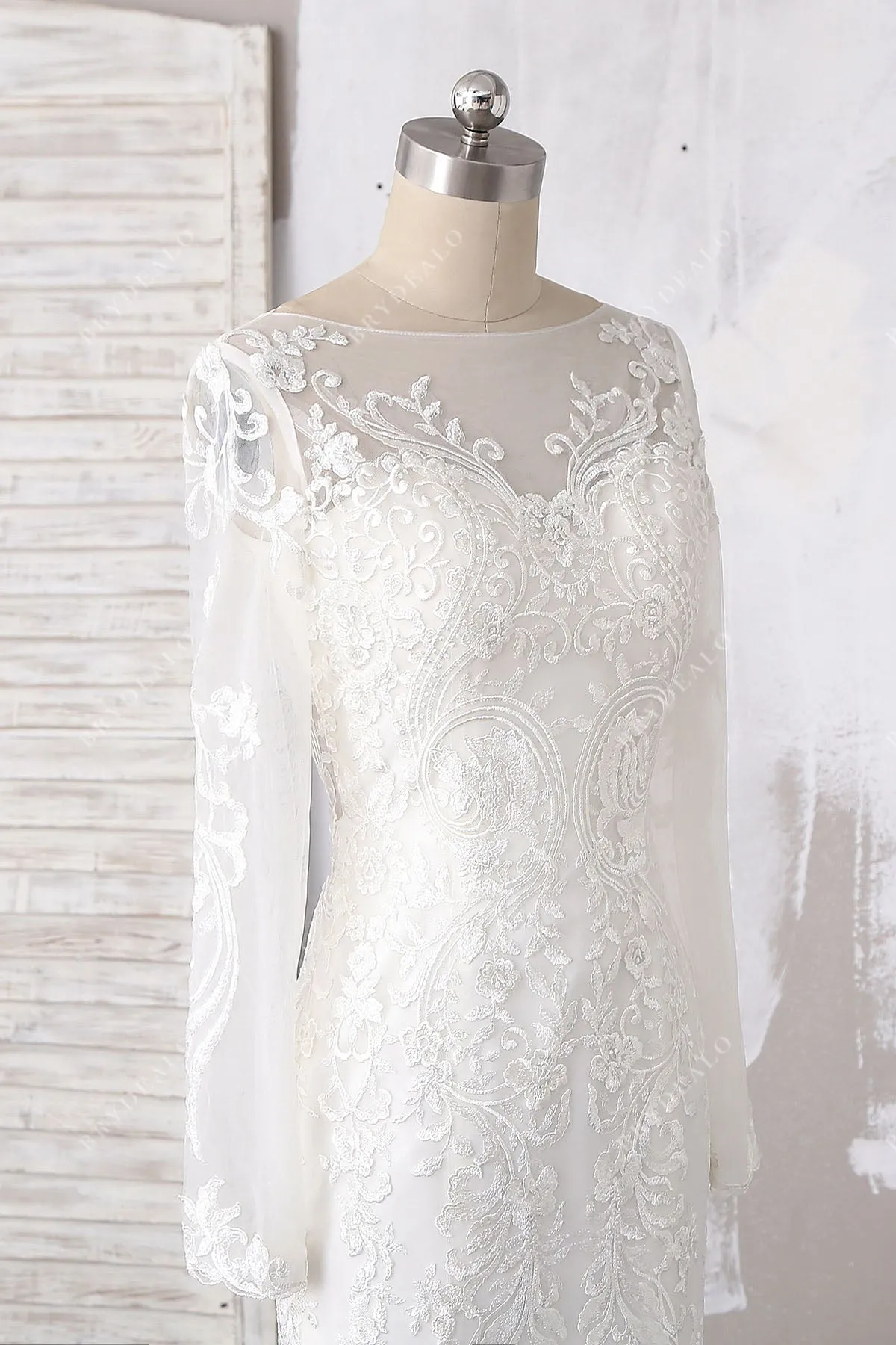 Designer Lace Long Sleeves Bustle Mermaid Wedding Dress