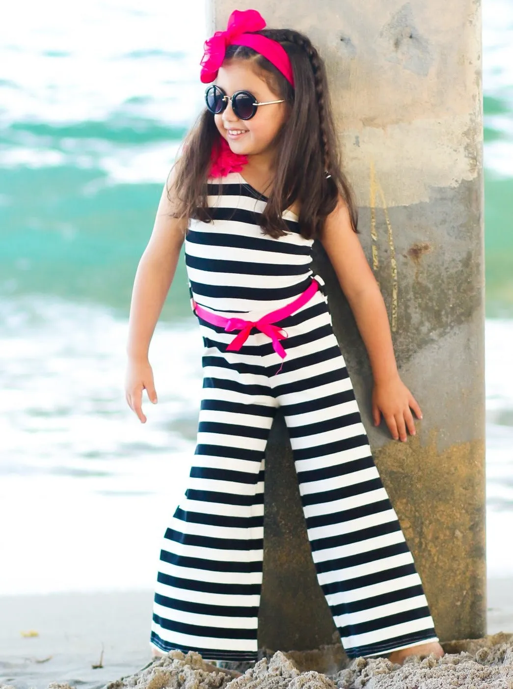 Girls Black And White Striped One Shoulder Palazzo Jumpsuit with Hot Pink Flower And Satin Sash