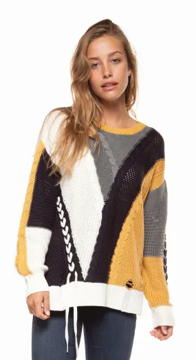 Long sleeve color block cable knit sweater with lace-up trim