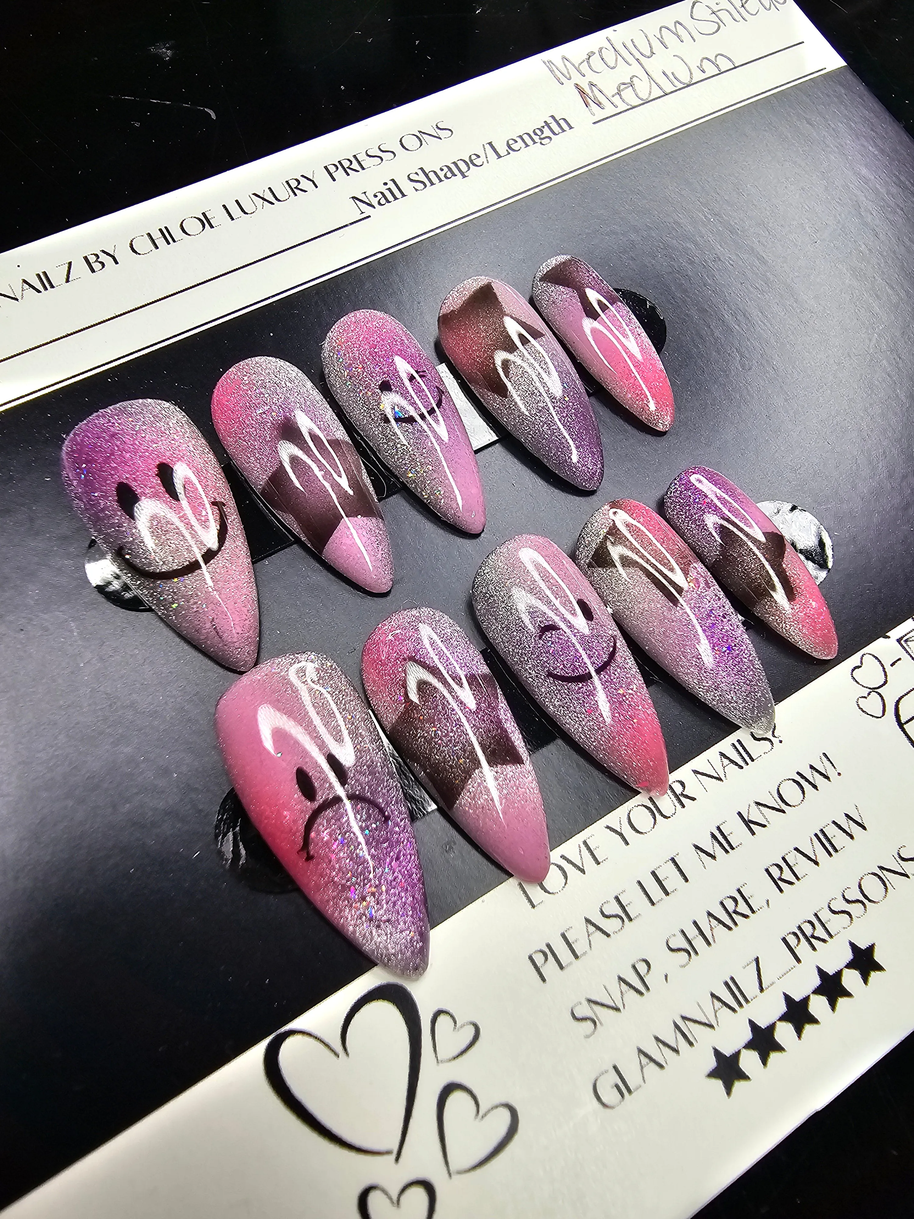 Medium Almond Airbrushed Press-On Nails | Smiley & Sad Face Design with Cat Eye Shimmer Base